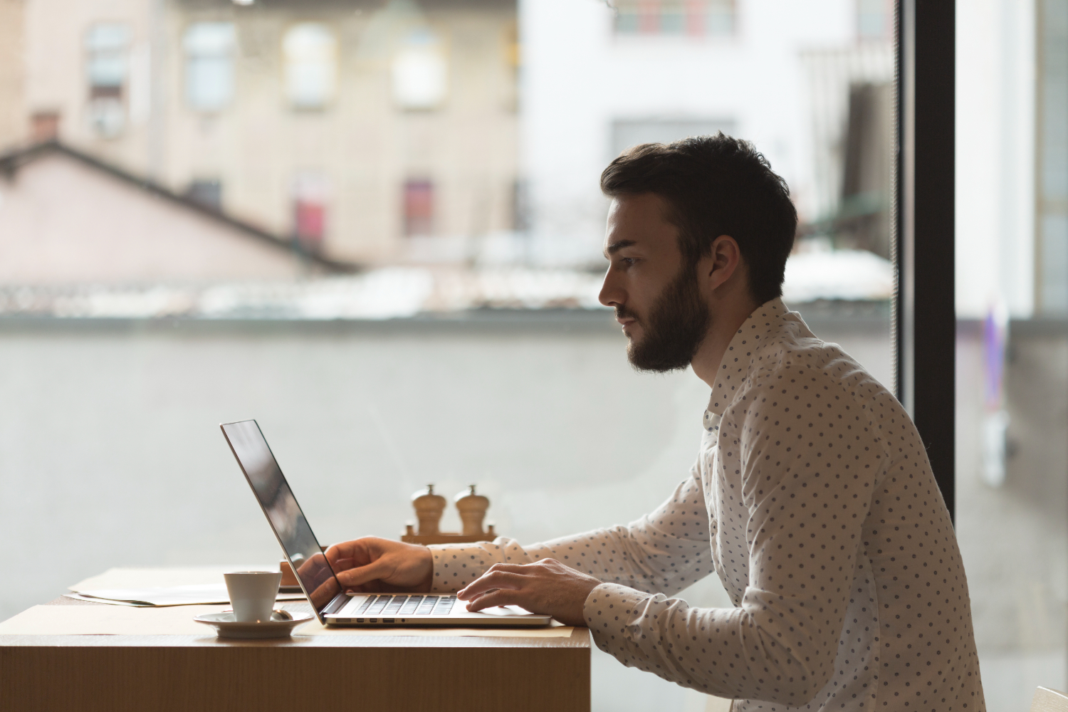 man working at a cafe 