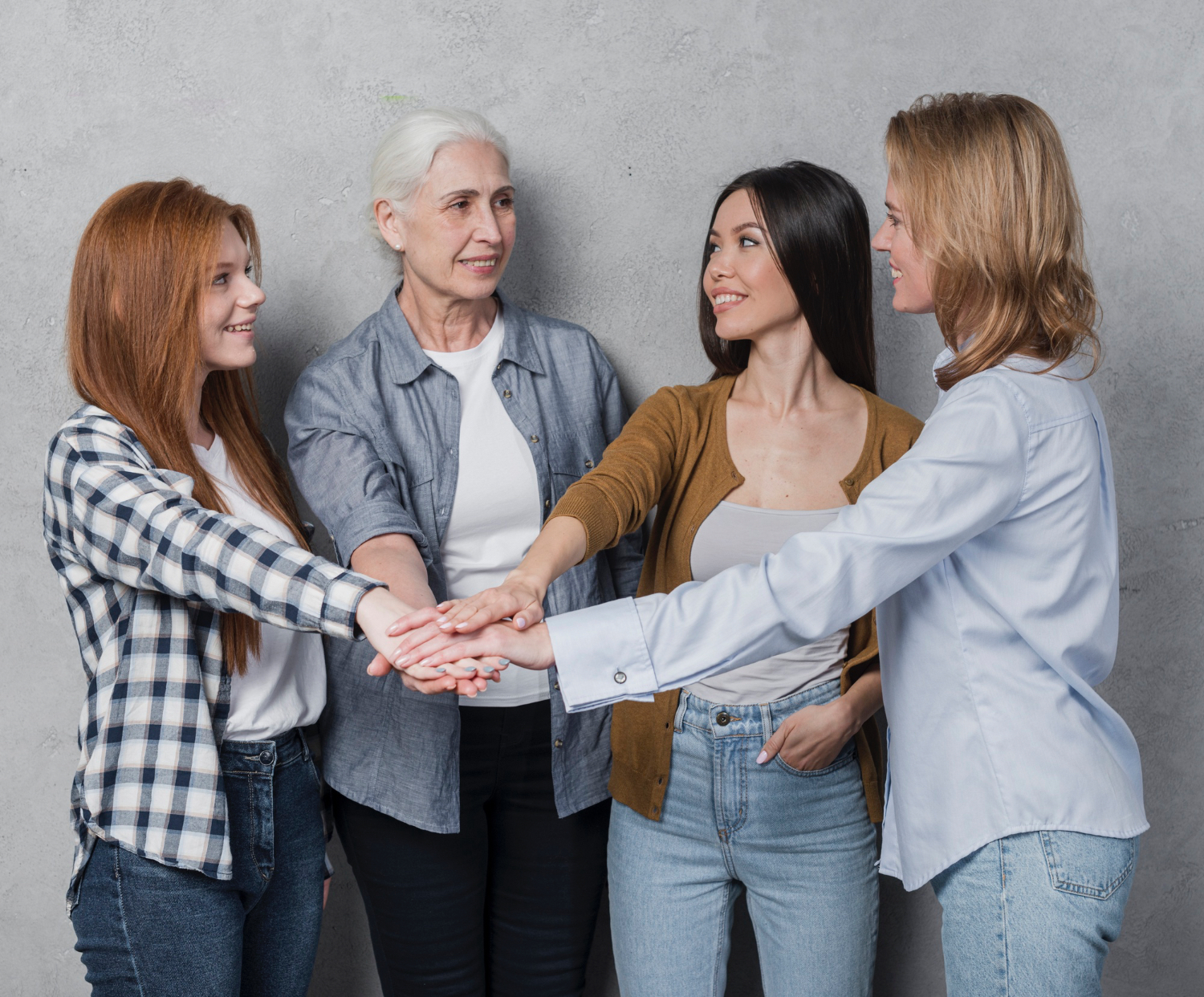 3 four employees in different generations working together